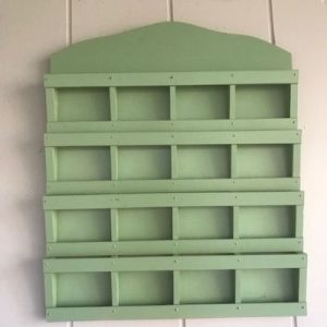 The letter holder was painted green after receiving a light sanding.